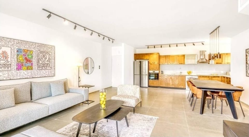 	Enjoy a spacious open-concept living room and kitchen, ideal for shared moments
