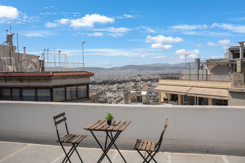 Central Athens apartment with Lycabettus views, balcony and rooftop access
