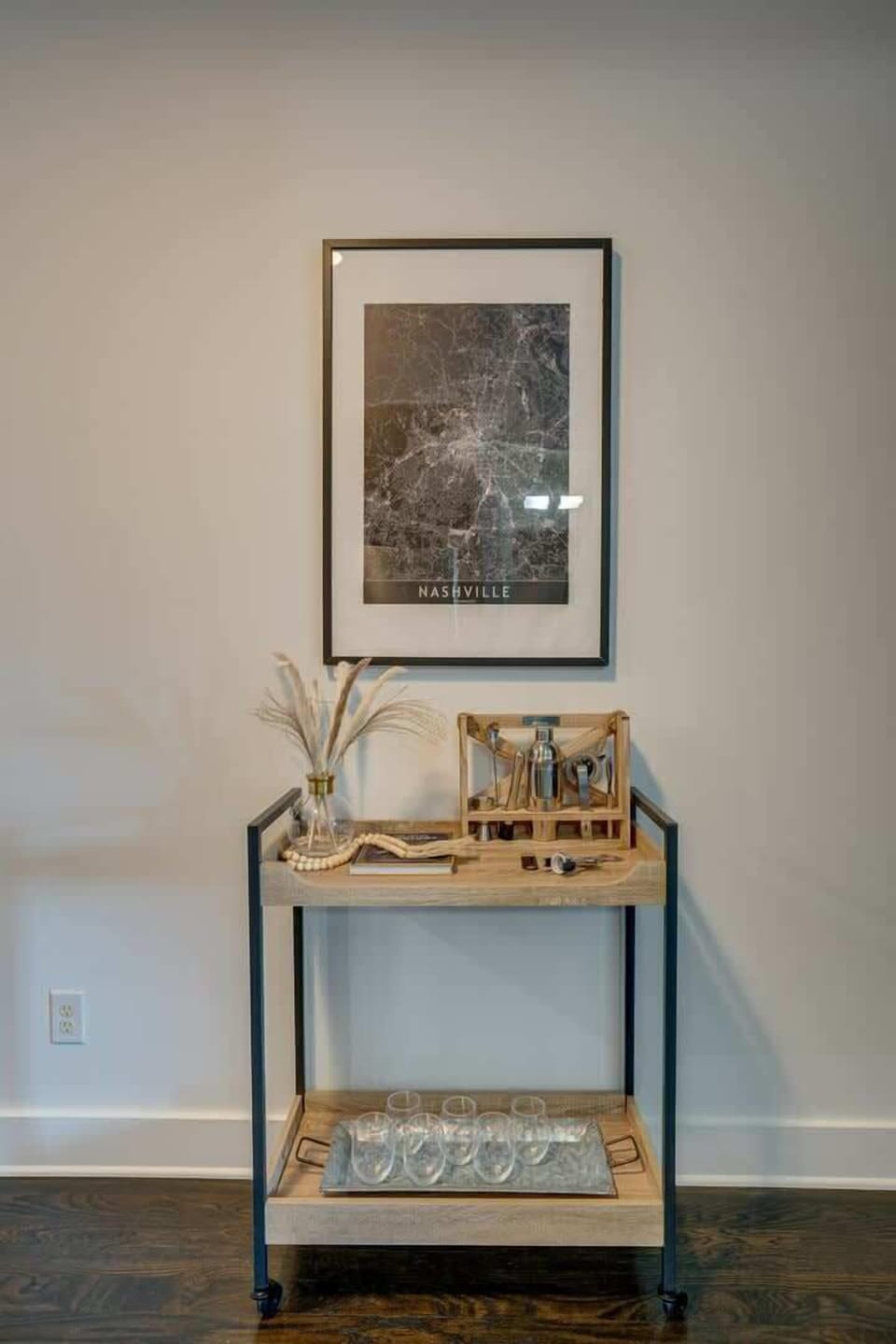 Unit 1: Fully equipped kitchen with stainless steel appliances and bar seating.