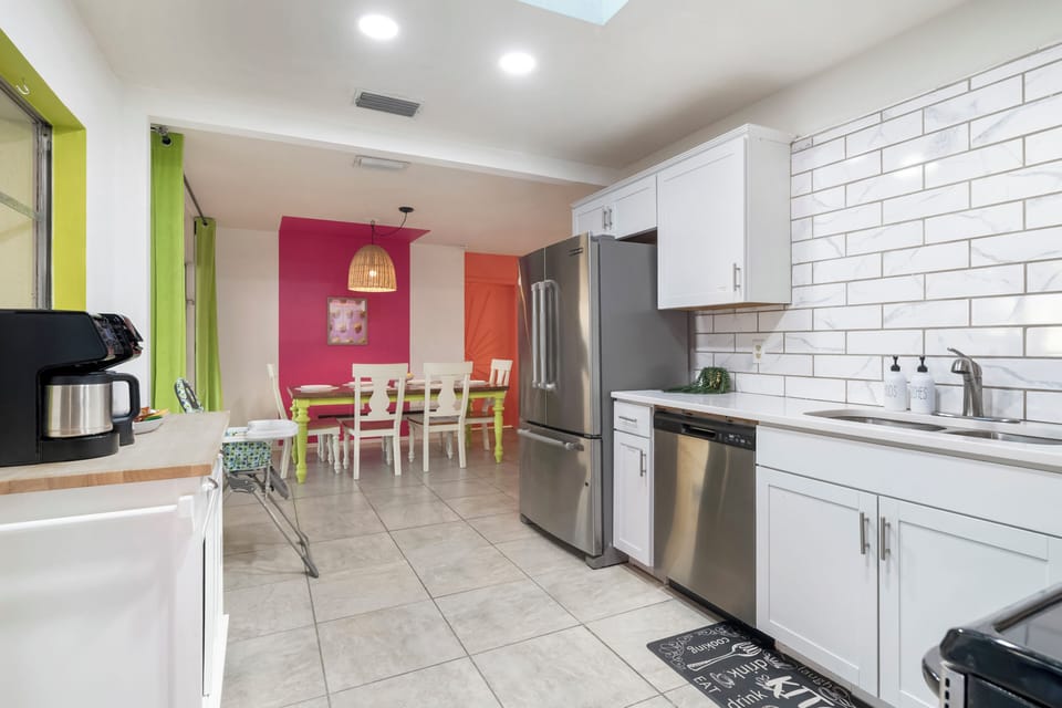 Share meals, play cards, or plan adventures in this vibrant dining area. 