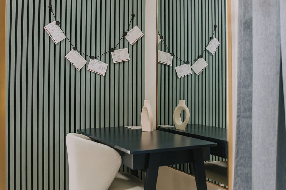 A desk for those who need to do work, and a message wall to leave inspiration for future visitors on their own migration through life.