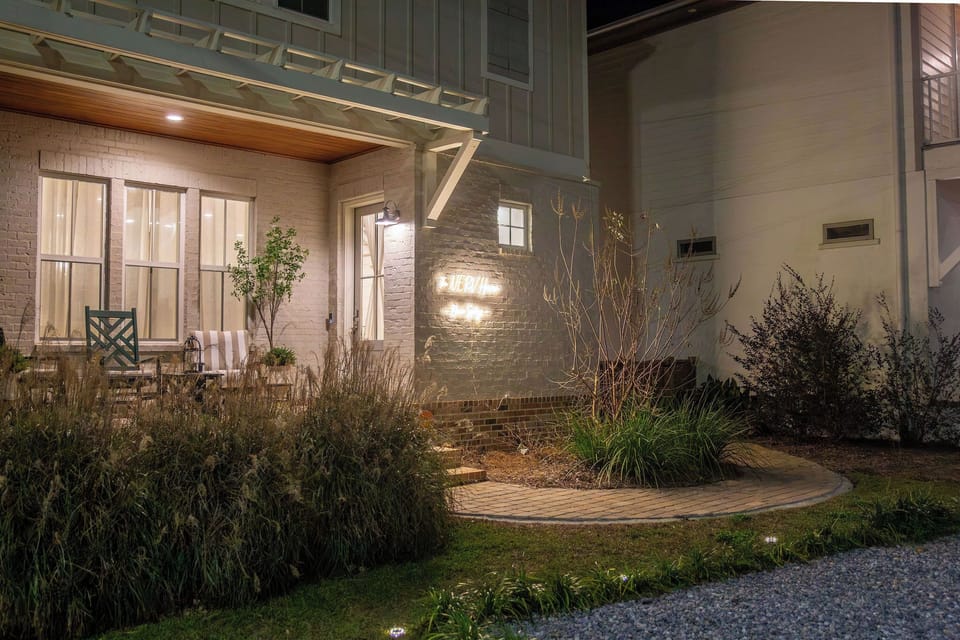 The front of the house has two parking spots and a beautiful patio from which various annual parades can be viewed.