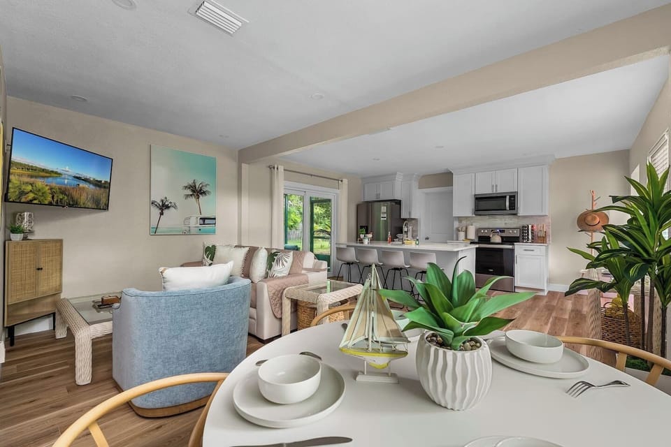 Living Room | Bright and open kitchen, dining and living spaces to allow everyone a chance to gather together