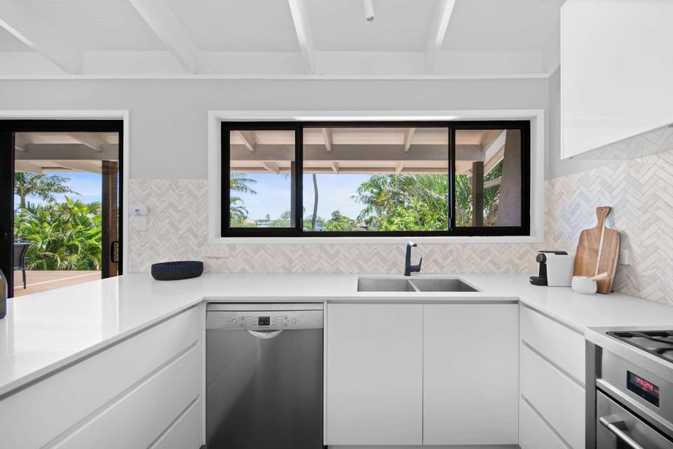 Kitchen flowing seamlessly into the dining area.