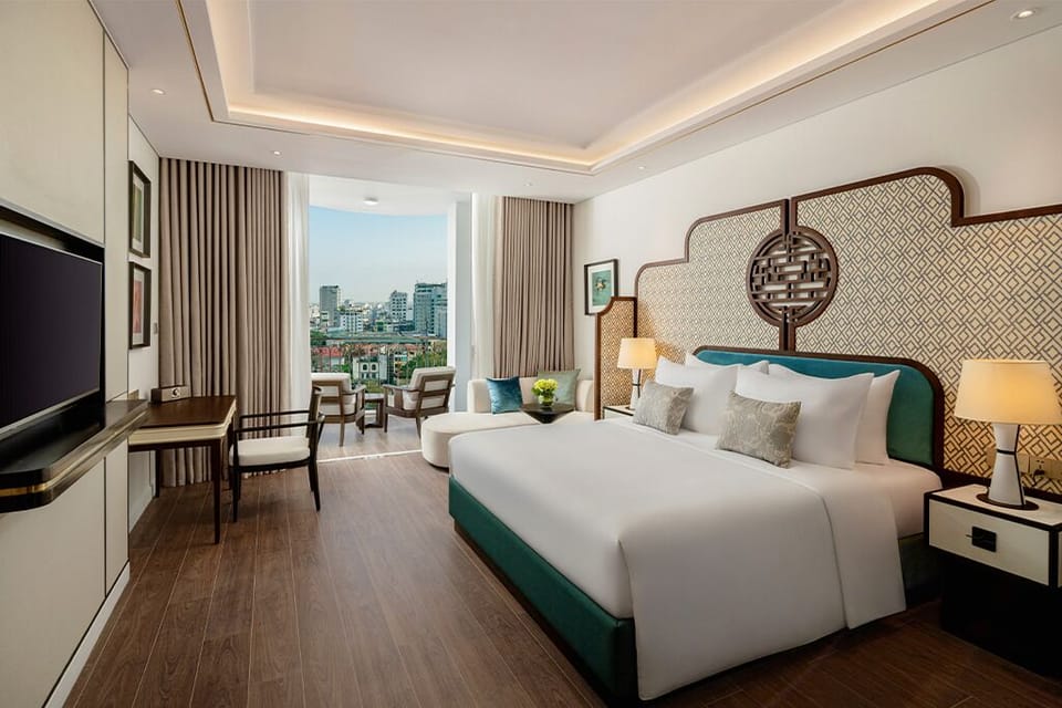 Family Room, River View | Minibar (free items), in-room safe, desk, soundproofing
