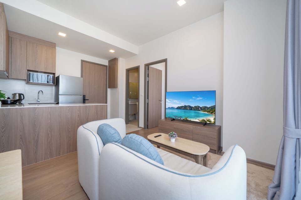 Condo, 2 Bedrooms | Living area | Flat-screen TV