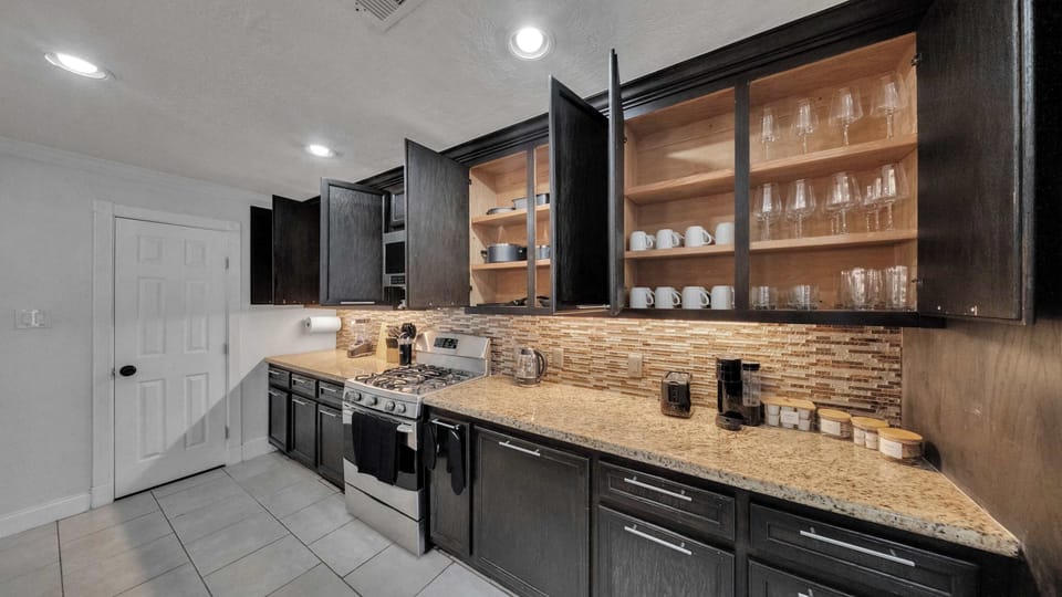 Granite counters and stainless steel appliances make cooking easy and enjoyable.