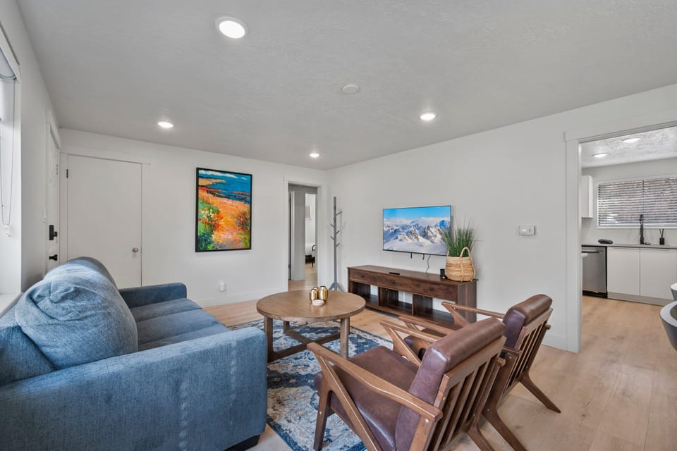 The Great Room has a queen sofa sleeper, 55" Smart TV and Dining Area