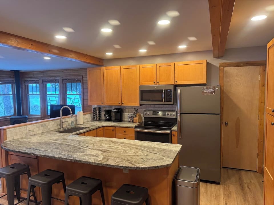 Fully Stocked Kitchen in open concept Living Room/Dining Room area