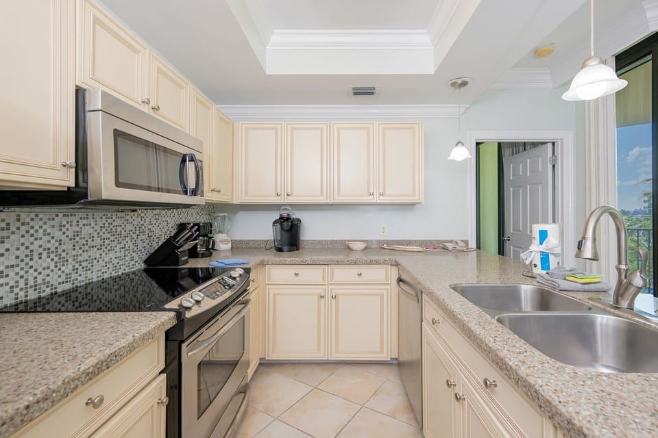 Condo, 2 Bedrooms | Private kitchen | Coffee/tea maker, fridge, oven