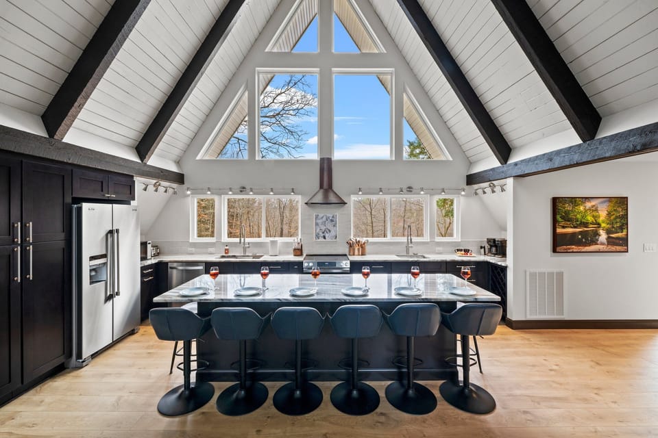 The 10-foot island — built for shared meals, half-finished puzzles, and long conversations.