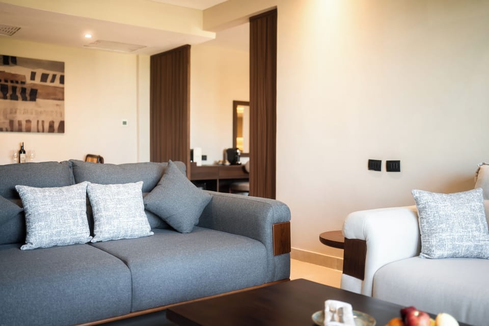 Royal Suite, Sea View | Living area | TV