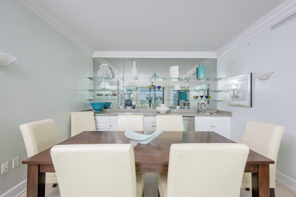 Gather around the elegant dining table and enjoy quality time surrounded by delightful decor