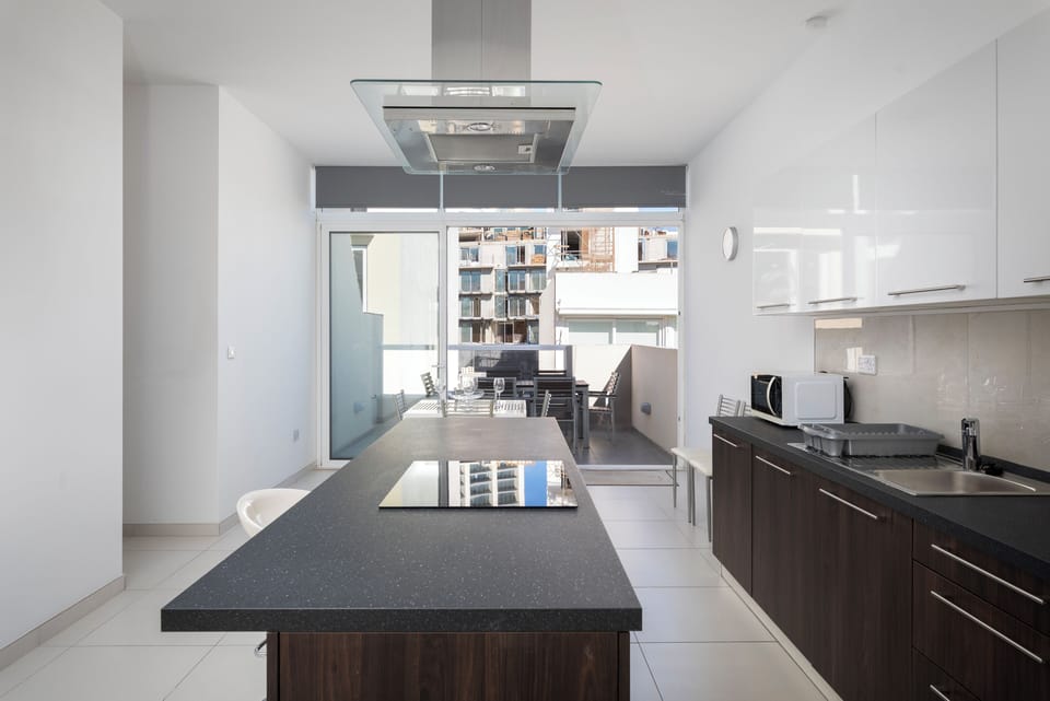 Penthouse, City View | Private kitchen | Electric kettle, toaster