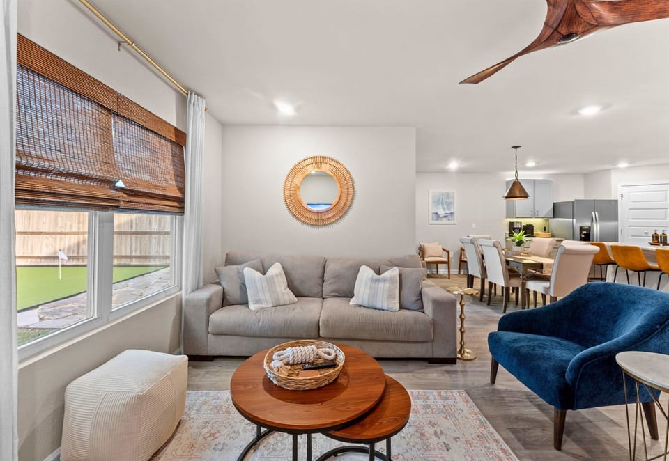 Natural light fills the space, creating a calm and inviting spot to watch TV, read, or catch up with family.