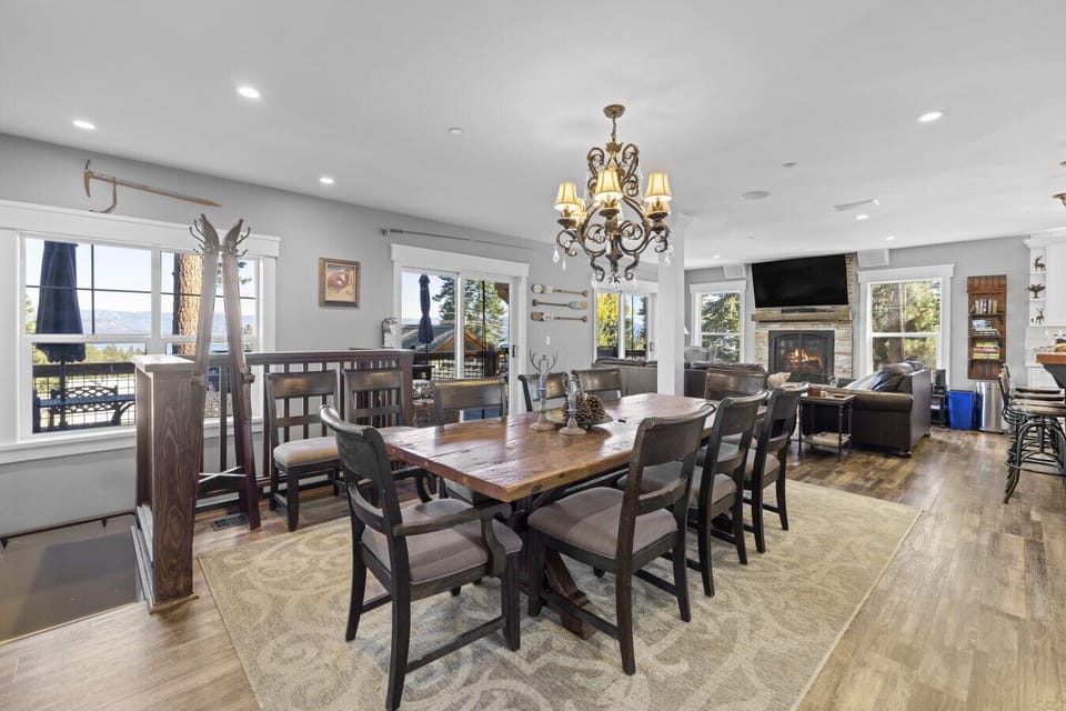 Dining Area | Table Seats 8 | Deck Access & Lake Views