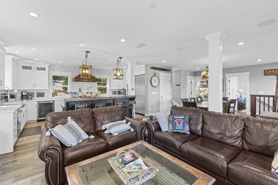 Living Room 1 | Stone Fireplace, Large TV & Open-Concept Comfort