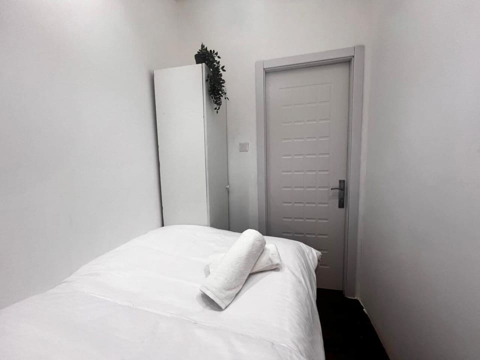 Economy Double Room, Balcony, City View | Desk, laptop workspace, iron/ironing board, free WiFi