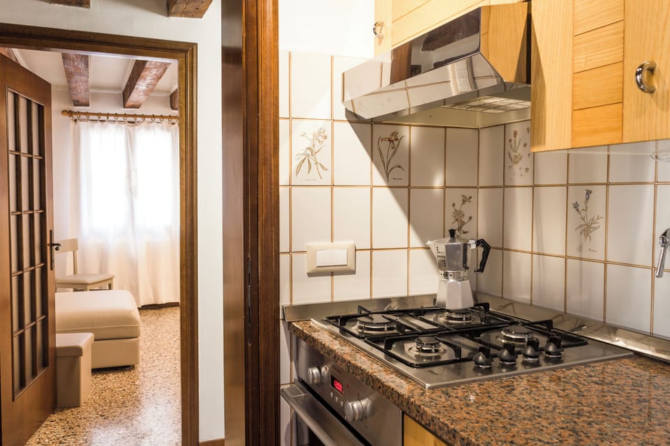 Superior Apartment, Canal View | Private kitchen | Fridge, oven, stovetop, dishwasher