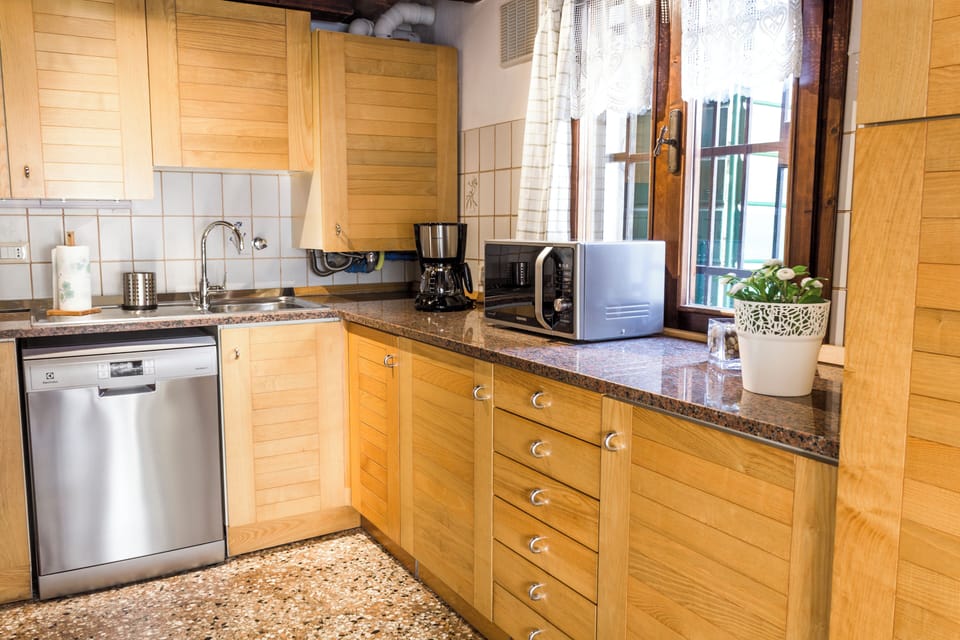 Superior Apartment, Canal View | Private kitchen | Fridge, oven, stovetop, dishwasher
