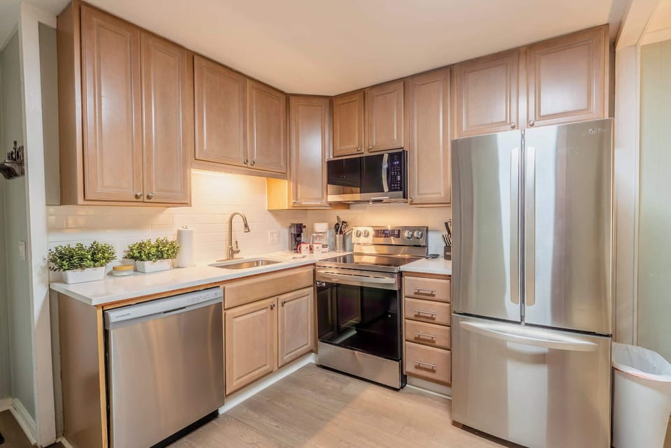 Functional kitchen paired with a dining table, perfect for casual dining.