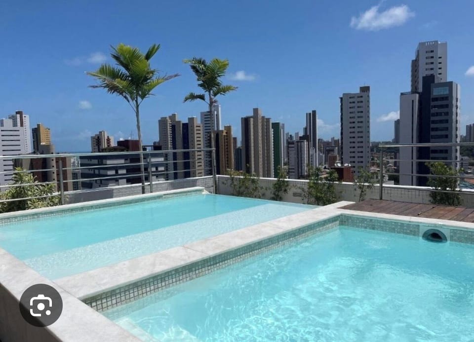 2 outdoor pools, sun loungers
