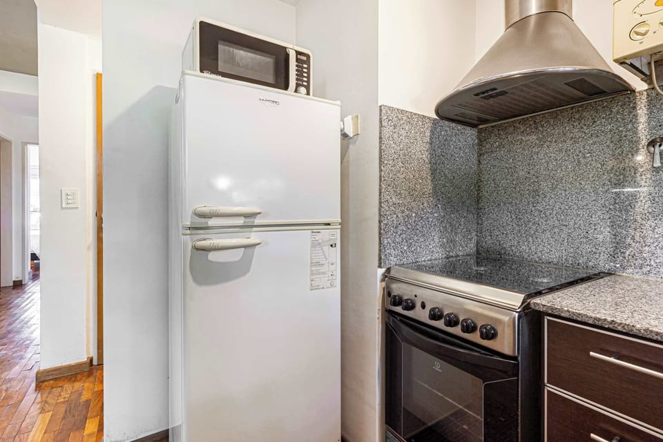 Apartment | Private kitchen | Full-size fridge, microwave, oven, cookware/dishes/utensils