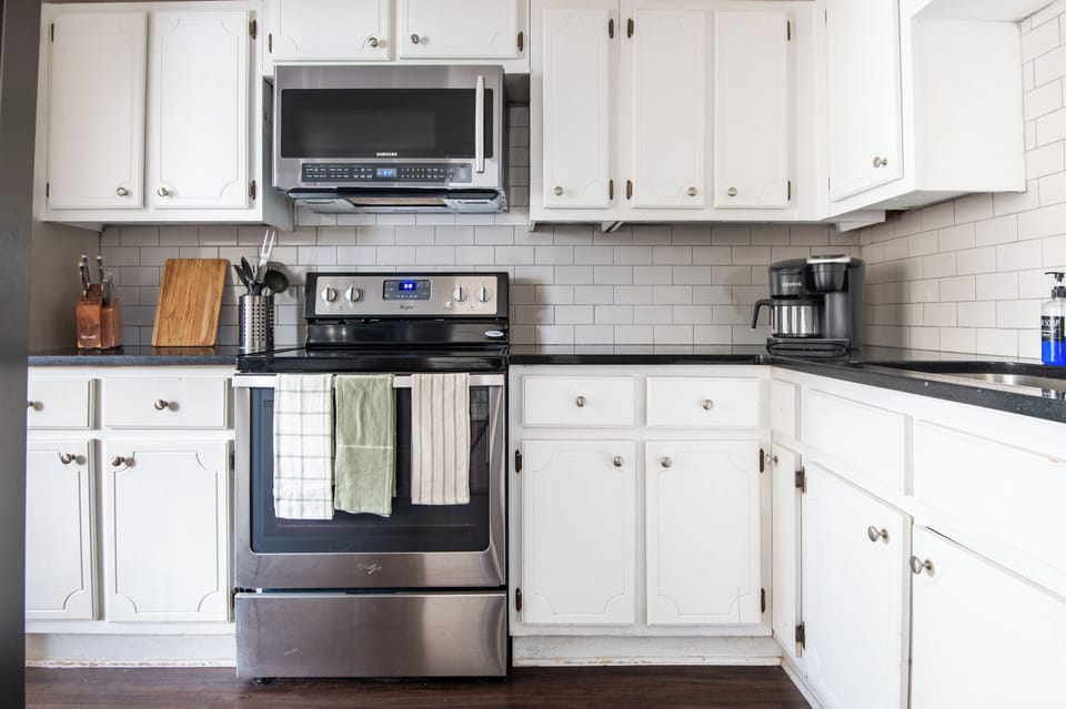 Fully equipped and updated kitchen with stainless appliances and plenty of space to cook and enjoy a cup of hot coffee.