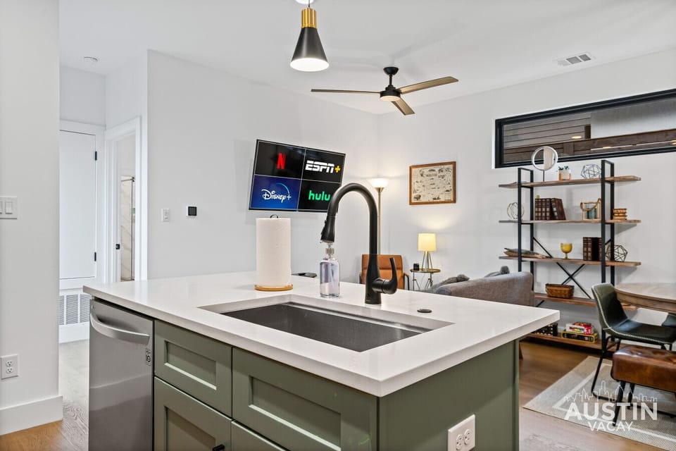 Cook, sip, or stream—this kitchen island handles your multitasking era.