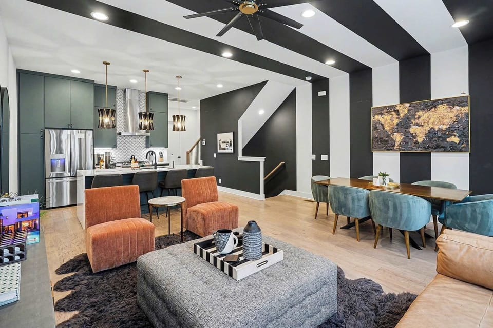 Designed for groups! Stylish lounge area, Smart TV, and integrated dining table.