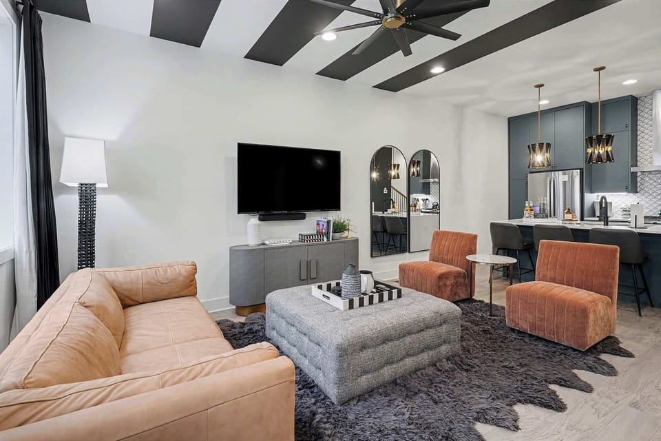 Designed for groups! Stylish lounge area, Smart TV, and integrated dining table.