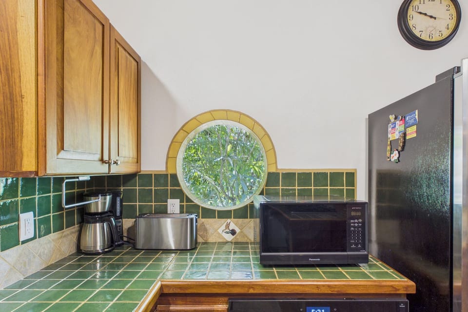 Kitchen- Microwave, Toaster, Refrigerator, Oven, Dishwasher, Coffee Maker, Gas Range.  Fully stocked Kitchen