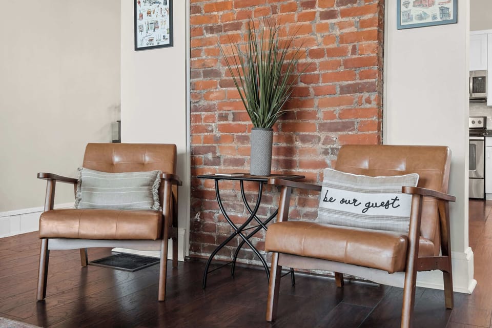 Living Room: Bright and cozy living room perfect for relaxing after a long day.