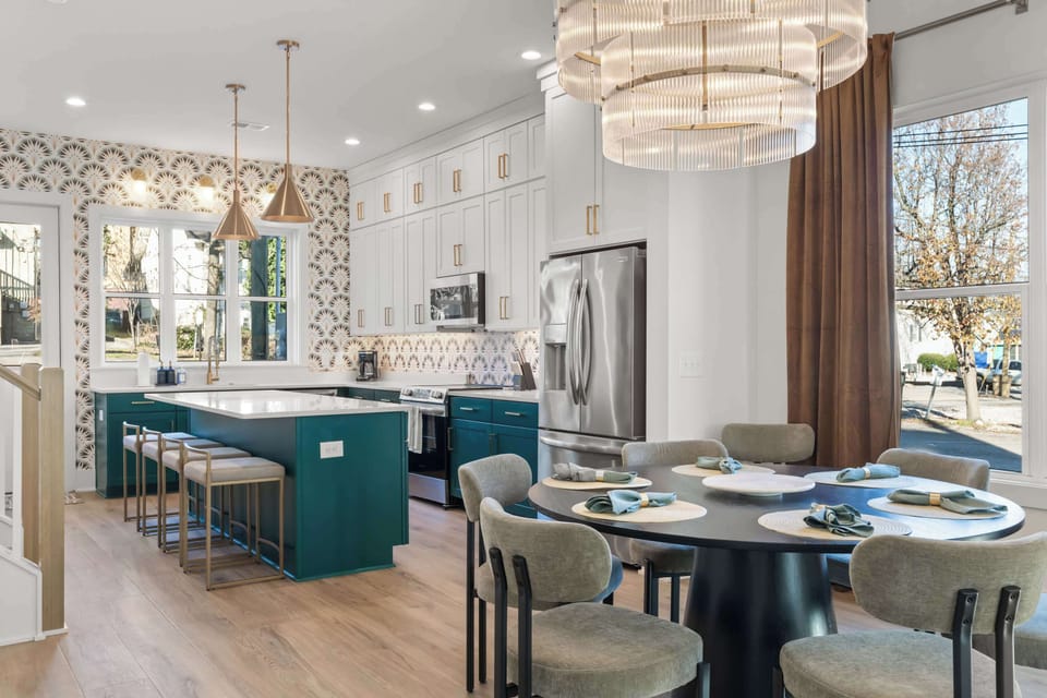Thoughtfully designed main level with a spacious dining area and elegant chandelier, perfect for shared meals and celebrations.