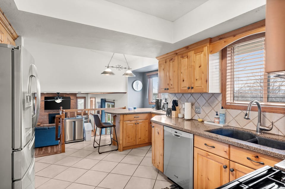 Kitchen with stainless steel appliances and everything you need to cook.