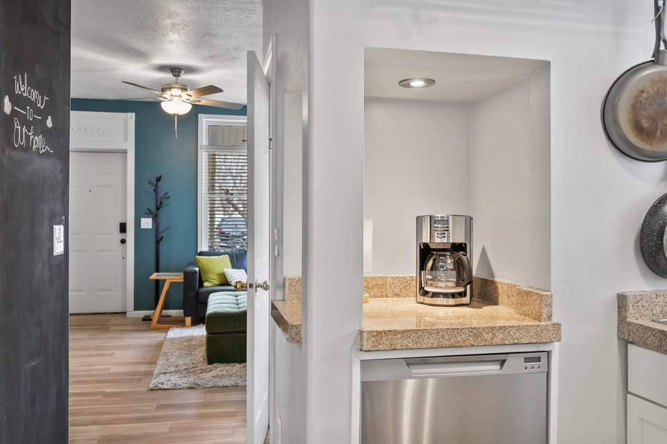 A full Galley Kitchen with dishwasher, Oven/Range, Microwave, Coffee Service and full size refrigerator