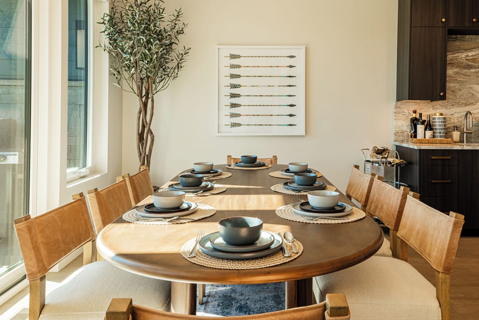 Large wood dining table with seating for 8