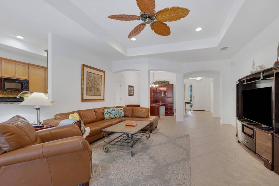 The main living area flows effortessly between the kitchen/dining nook and an open den.