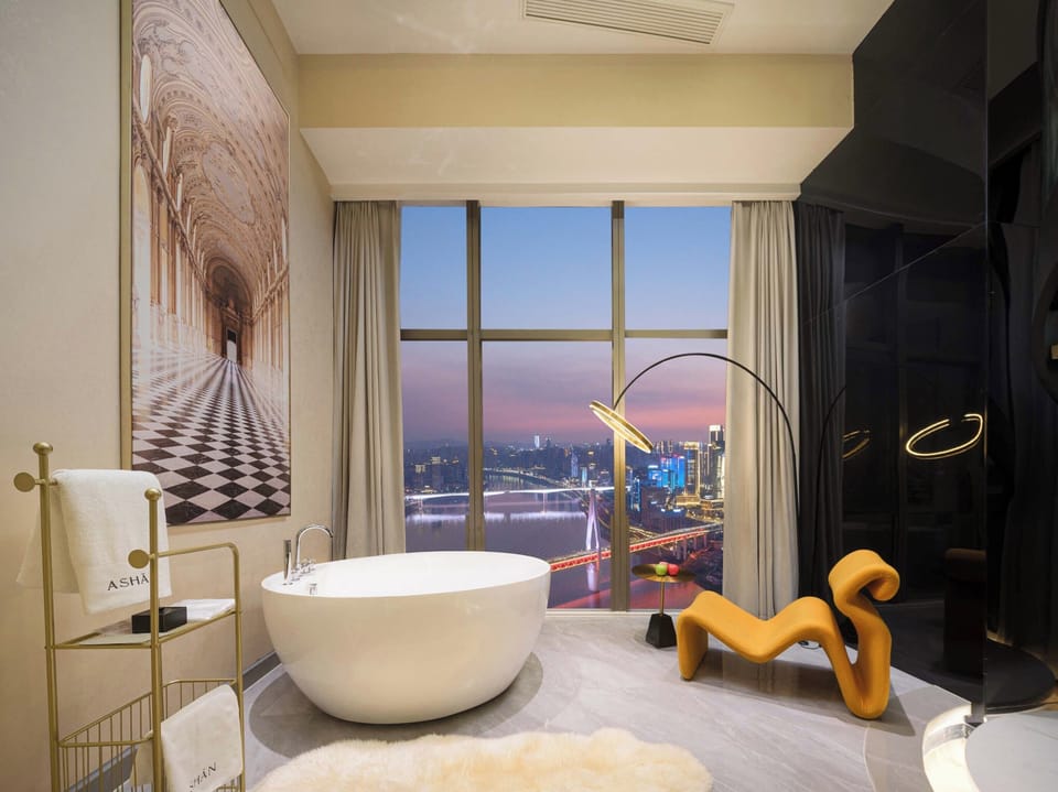 Superior Twin Room, River View | Deep soaking bathtub