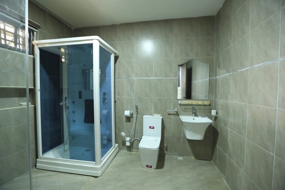 Comfort Room, Balcony, City View | Bathroom | Hair dryer, slippers, towels, soap