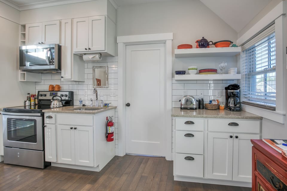 The kitchen is fully stocked for your cooking needs during your stay!