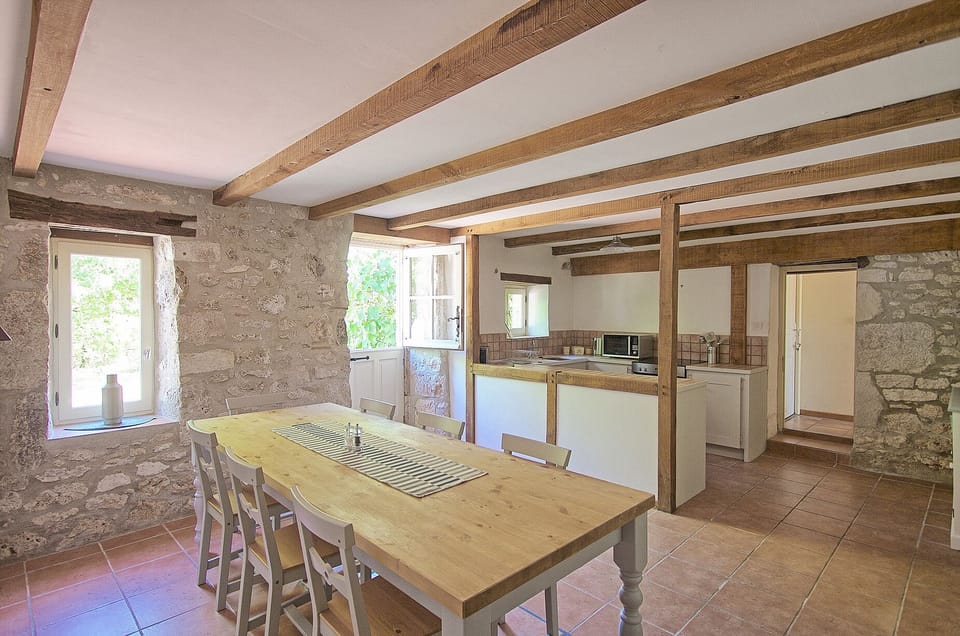 Accommodation downstairs includes 2 bedrooms, a bathroom and a large living area