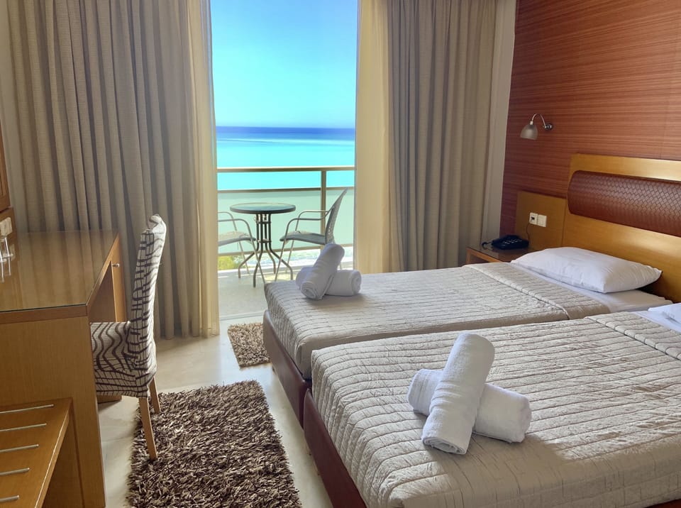 Standard Room, Sea View | Iron/ironing board, free cribs/infant beds, free WiFi, bed sheets