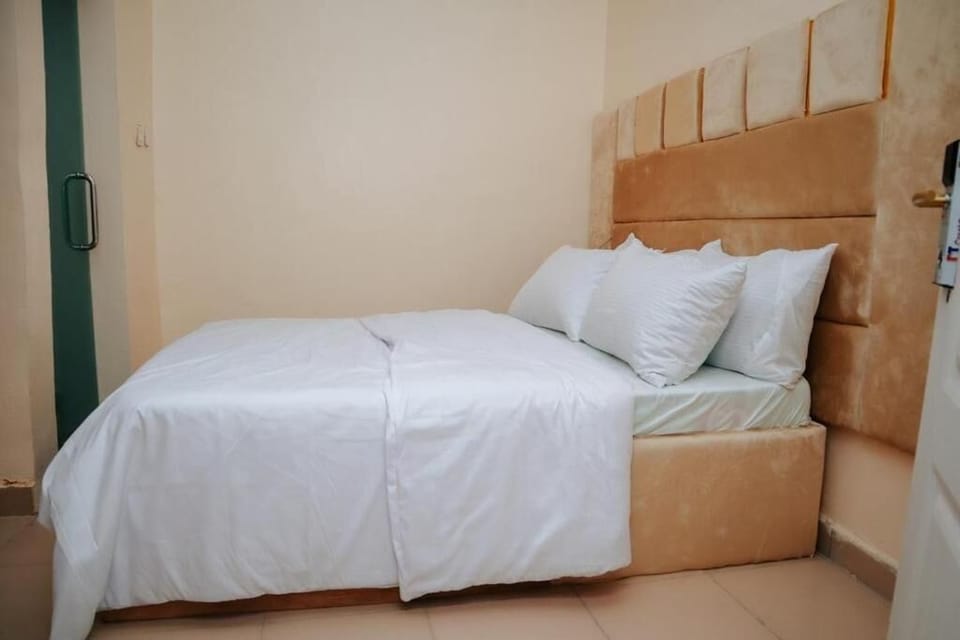 Economy Room, Balcony, City View | Desk, laptop workspace, blackout drapes, soundproofing