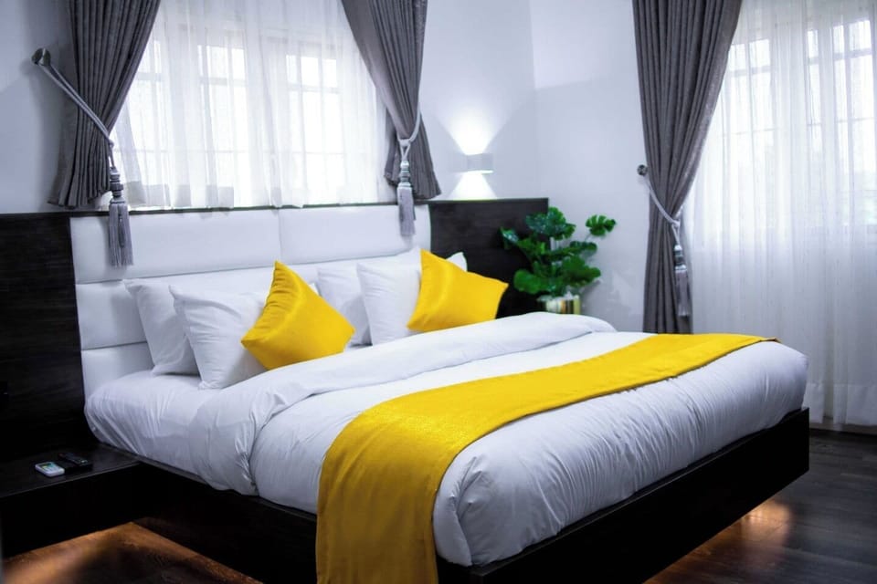 Economy Room, Balcony, City View | Desk, laptop workspace, blackout drapes, soundproofing