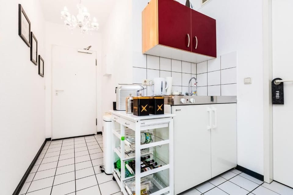 Deluxe Apartment, Balcony, City View | Mini-refrigerator