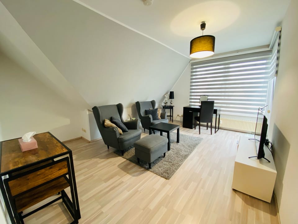 Deluxe Apartment, Balcony, City View | Free minibar items, desk, blackout drapes, soundproofing