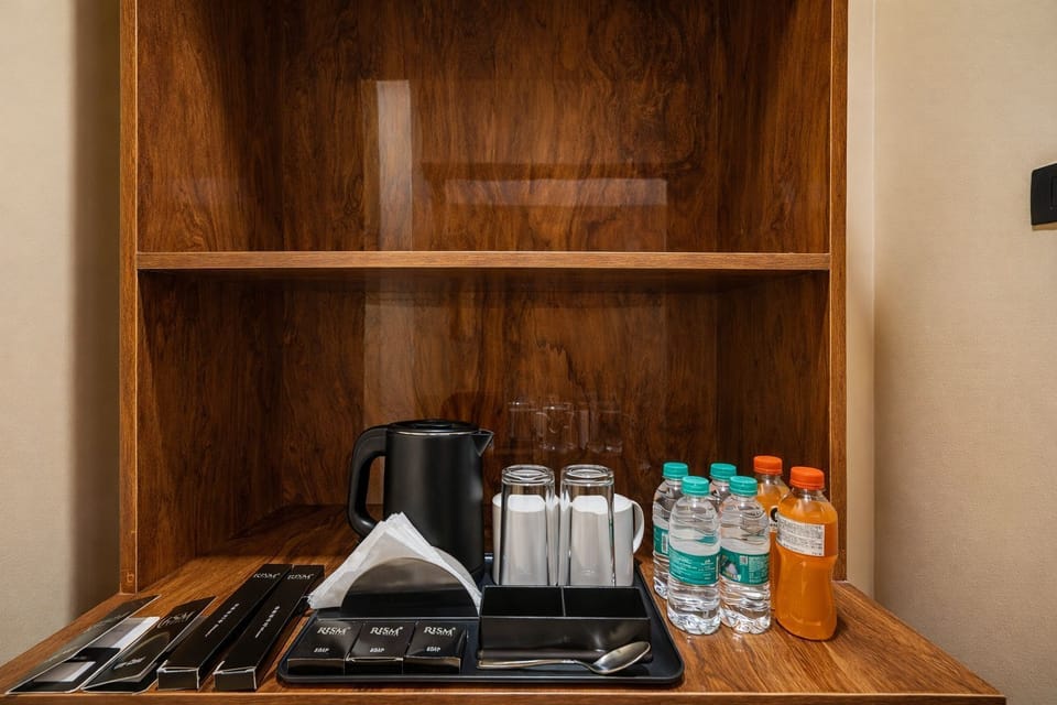 Deluxe Room | Coffee and/or coffee maker