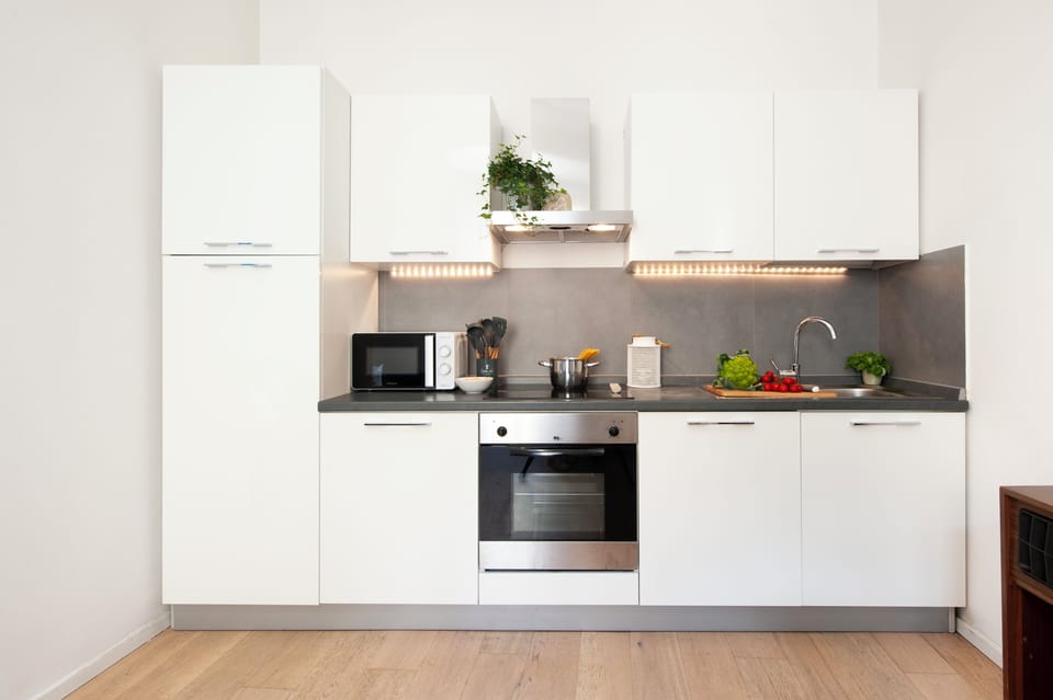Apartment (1 Bedroom) | Private kitchen | Microwave, oven, stovetop, dishwasher