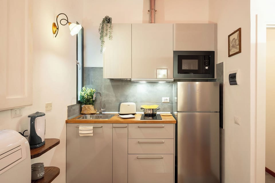 Apartment (1 Bedroom) | Private kitchen | Microwave, stovetop, espresso maker, electric kettle